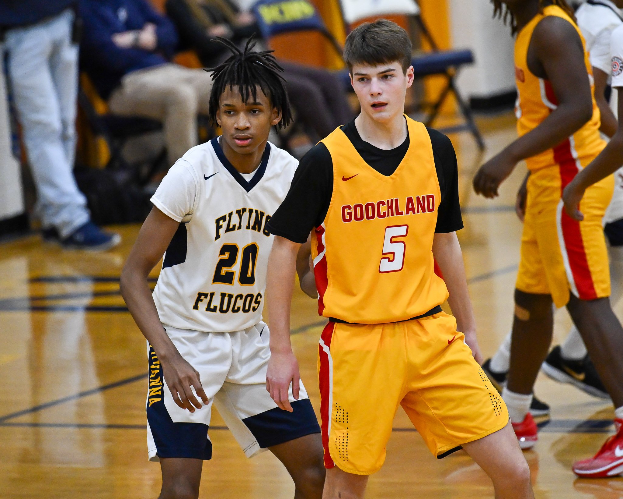 High school basketball game action featuring competitive play and athlete focus, photographed courtside by Scott Photography.