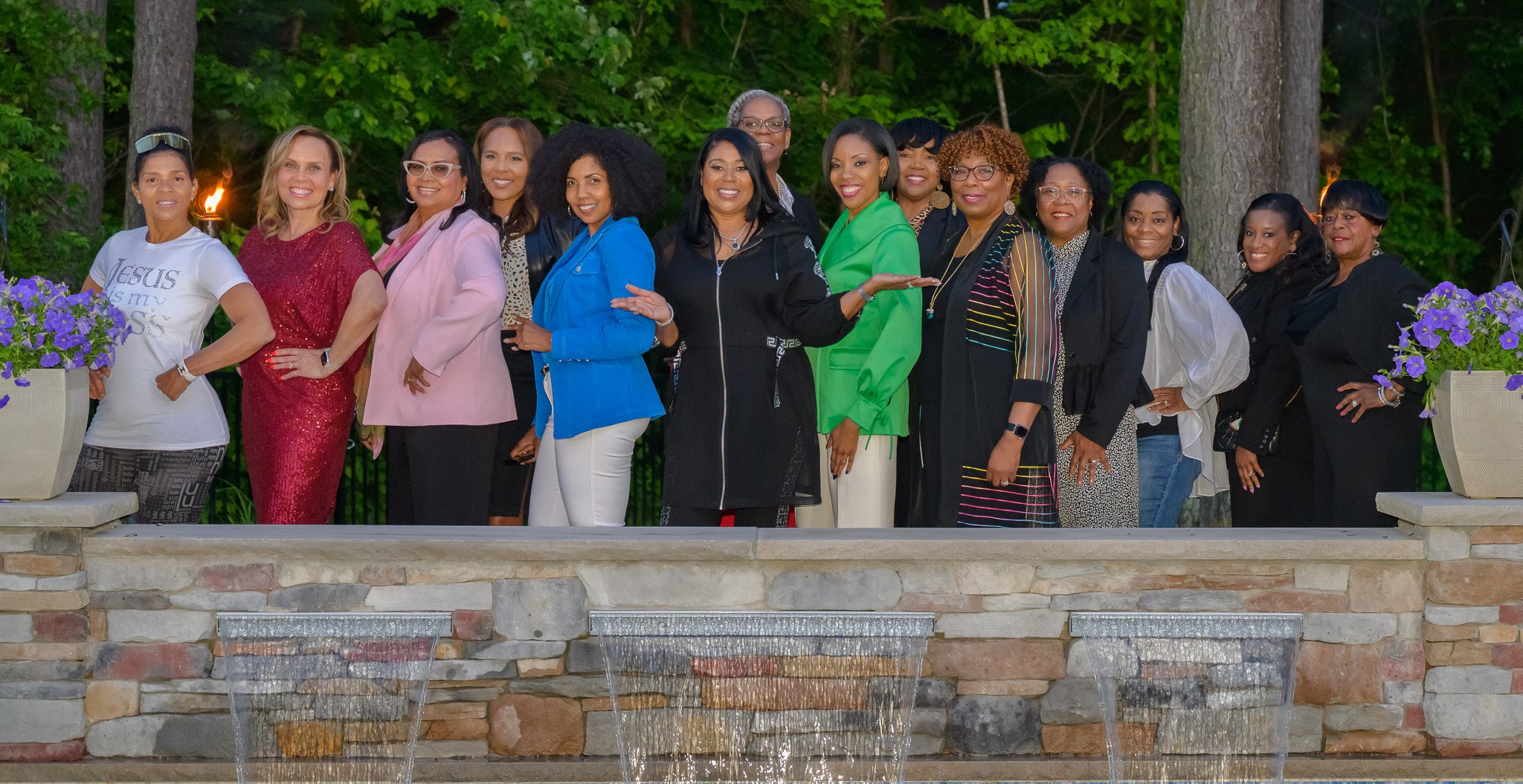 Group portrait of women leaders at a professional networking event, photographed outdoors during a corporate gathering in Richmond, VA.