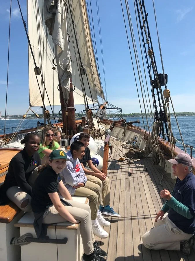 Amistad crew member Jason Hine leads a discussion Thursday, May 31, 2018, with students from New London’s Bennie Dover Jackson Middle School during an outing on the Thames River. (David Collins/The Day)
