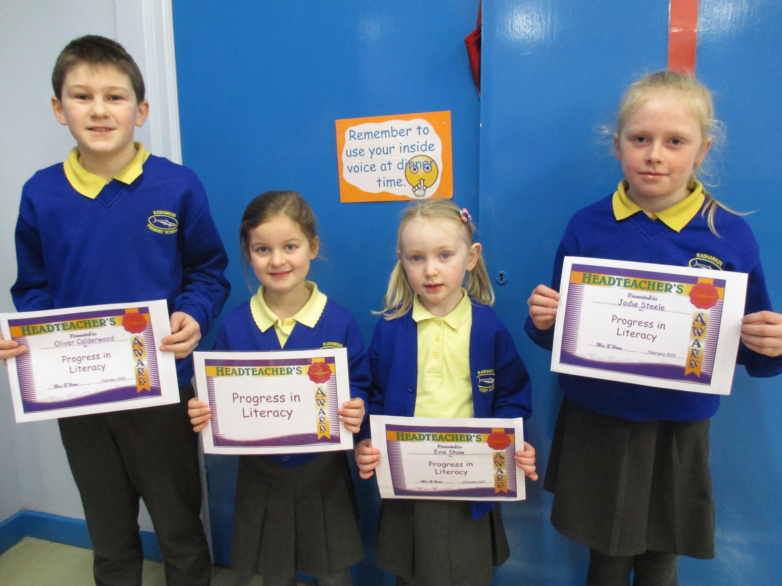 Oliver, Anna, Amelia and Jodie received certificates for ' Progress in Literacy'.