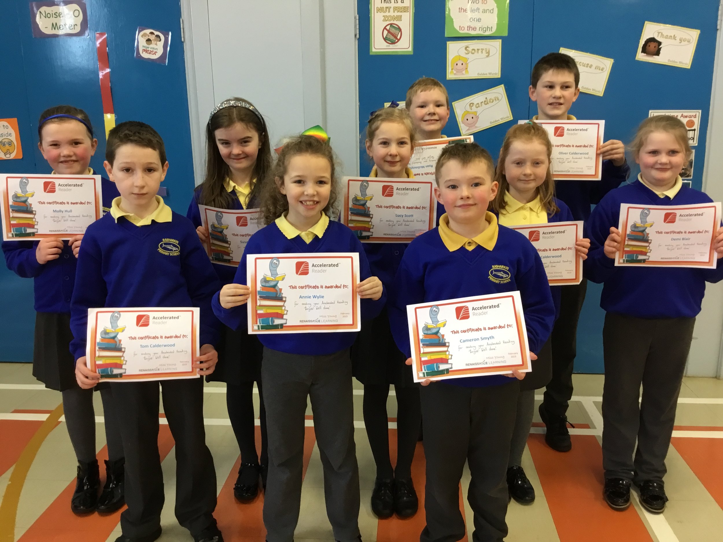  P5 children with their Accelerated Reading Certificates 