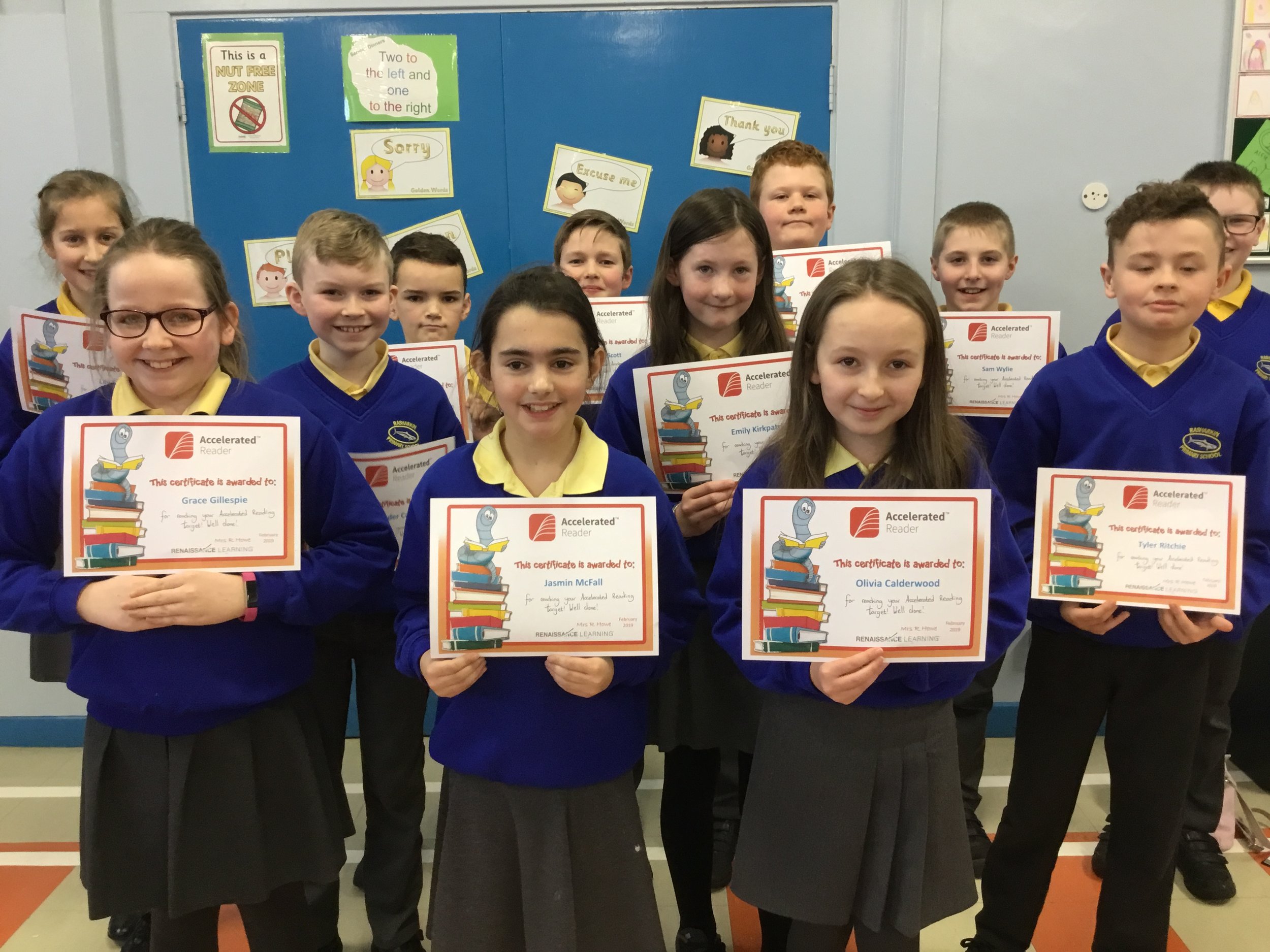  P7 children with their Accelerated Reading Certificates 