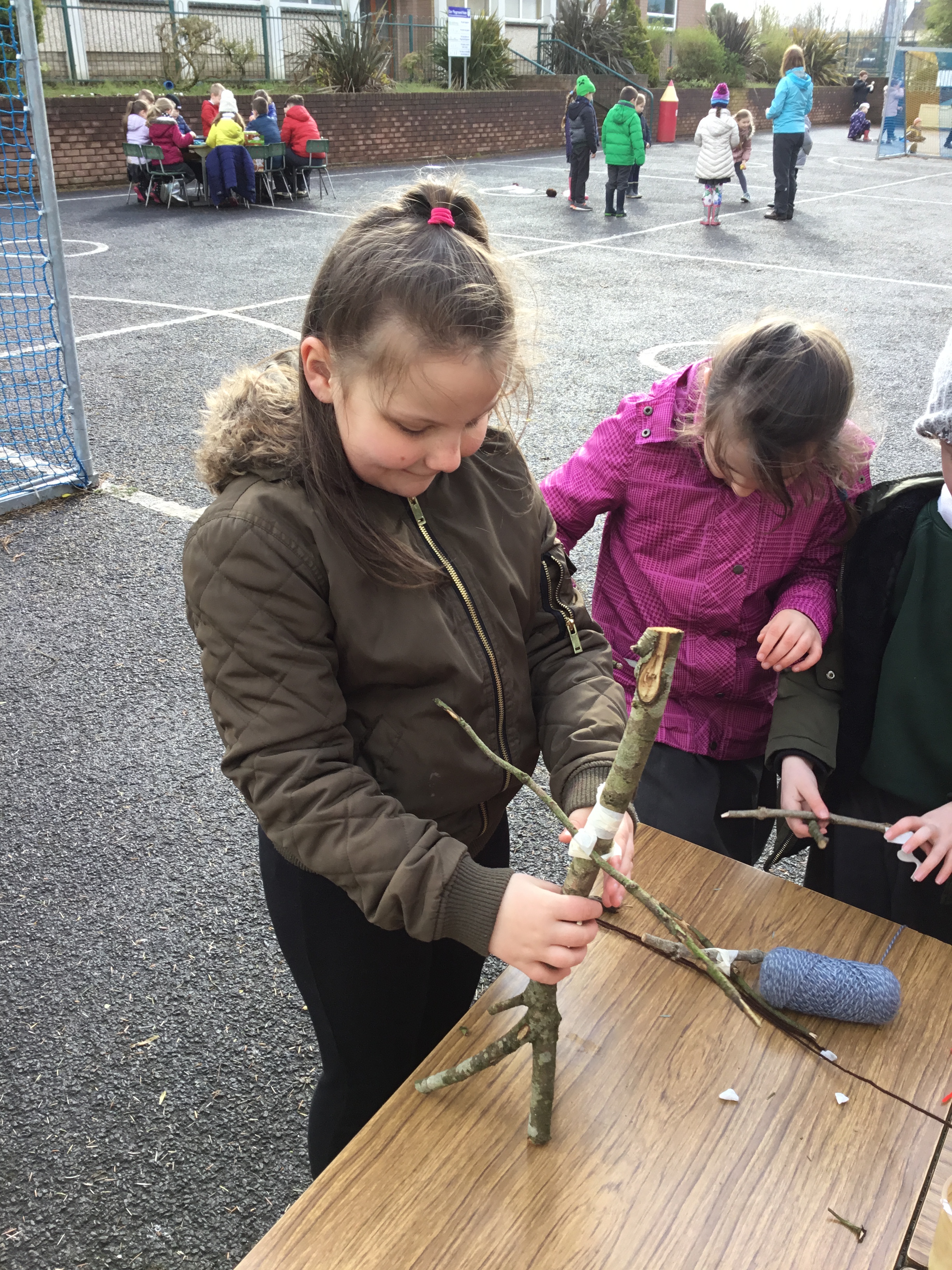 Kirsty working on her stick man.