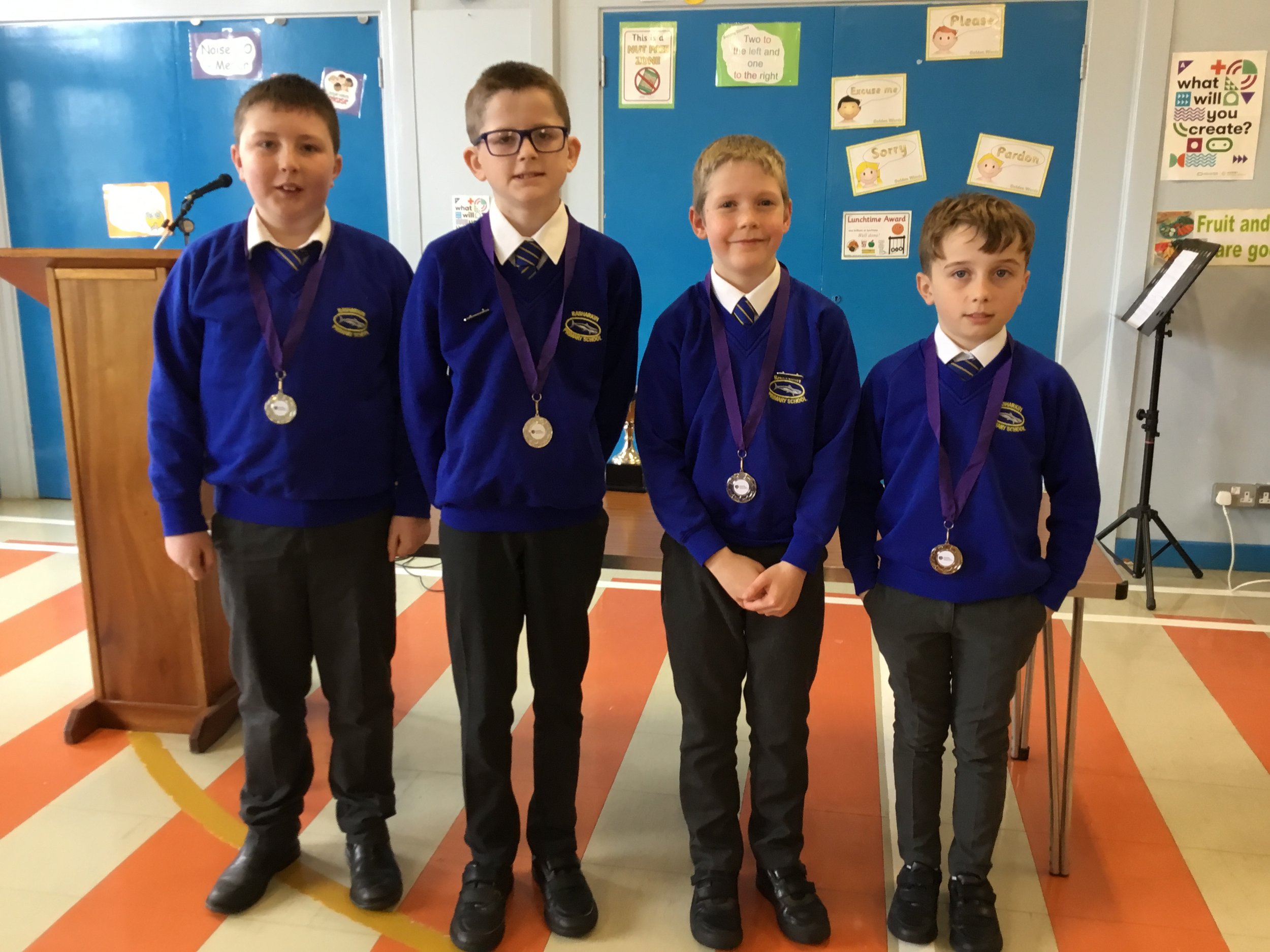 Isaac, Dan, Mark and Harry with their medals.