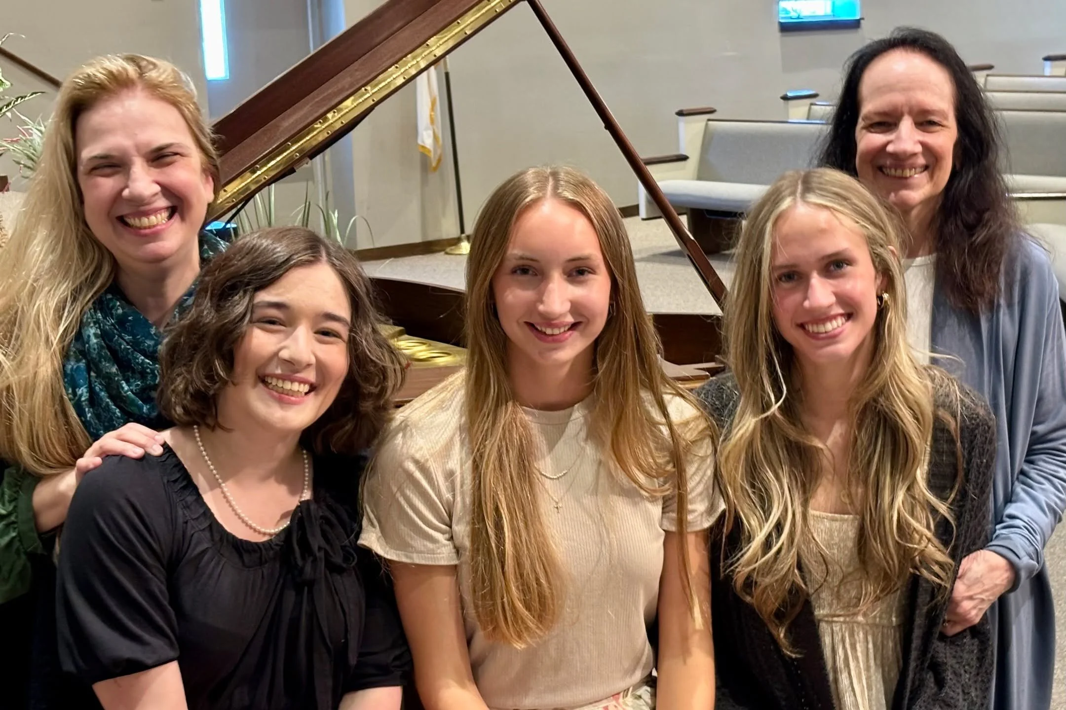Each year, Milford Square Music Studio has graduating seniors. This year we had three graduates. They had been with us for 13-14 years in our piano program and in our Kindermusik program before that. Here are the three seniors with their teachers.