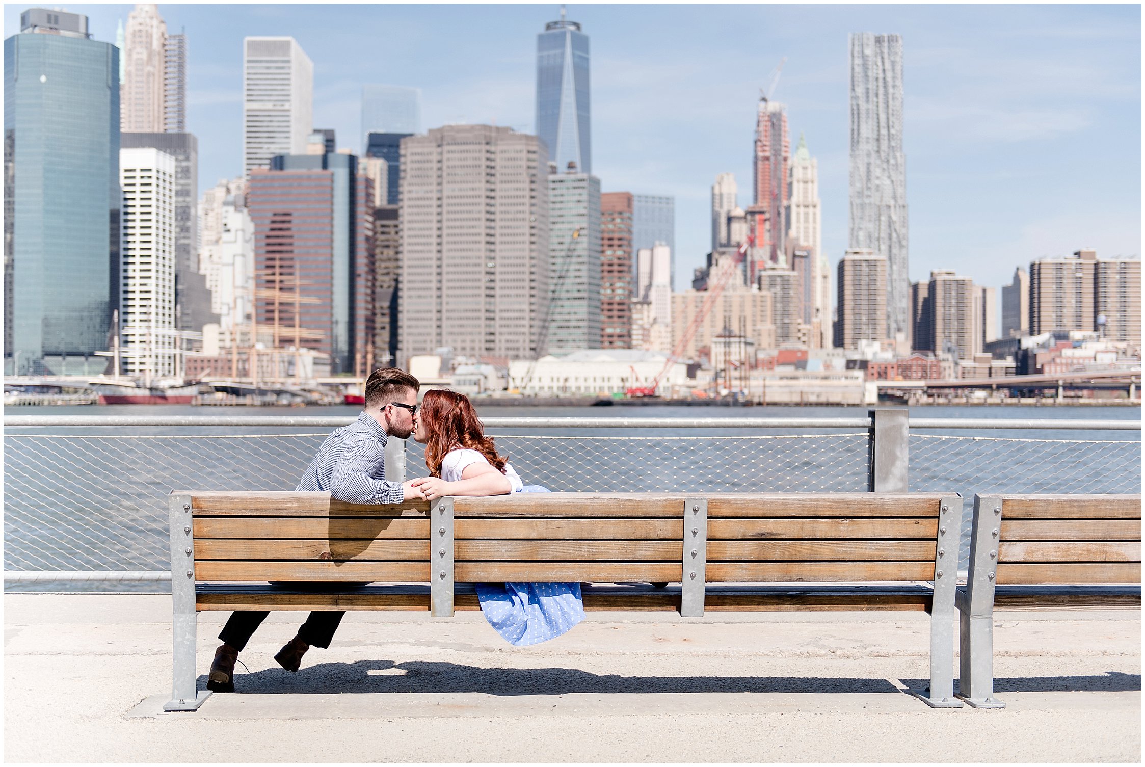 engagement portraits on the brooklyn promenade in dumbo brooklyn