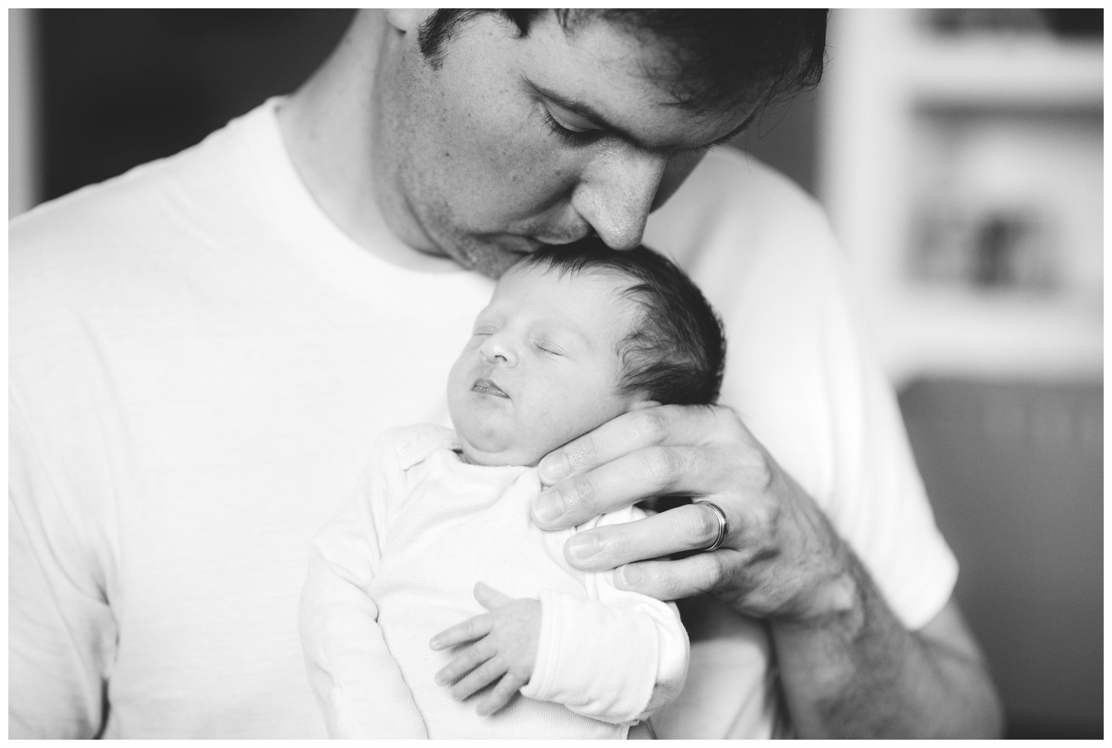 father and newborn daughter photography