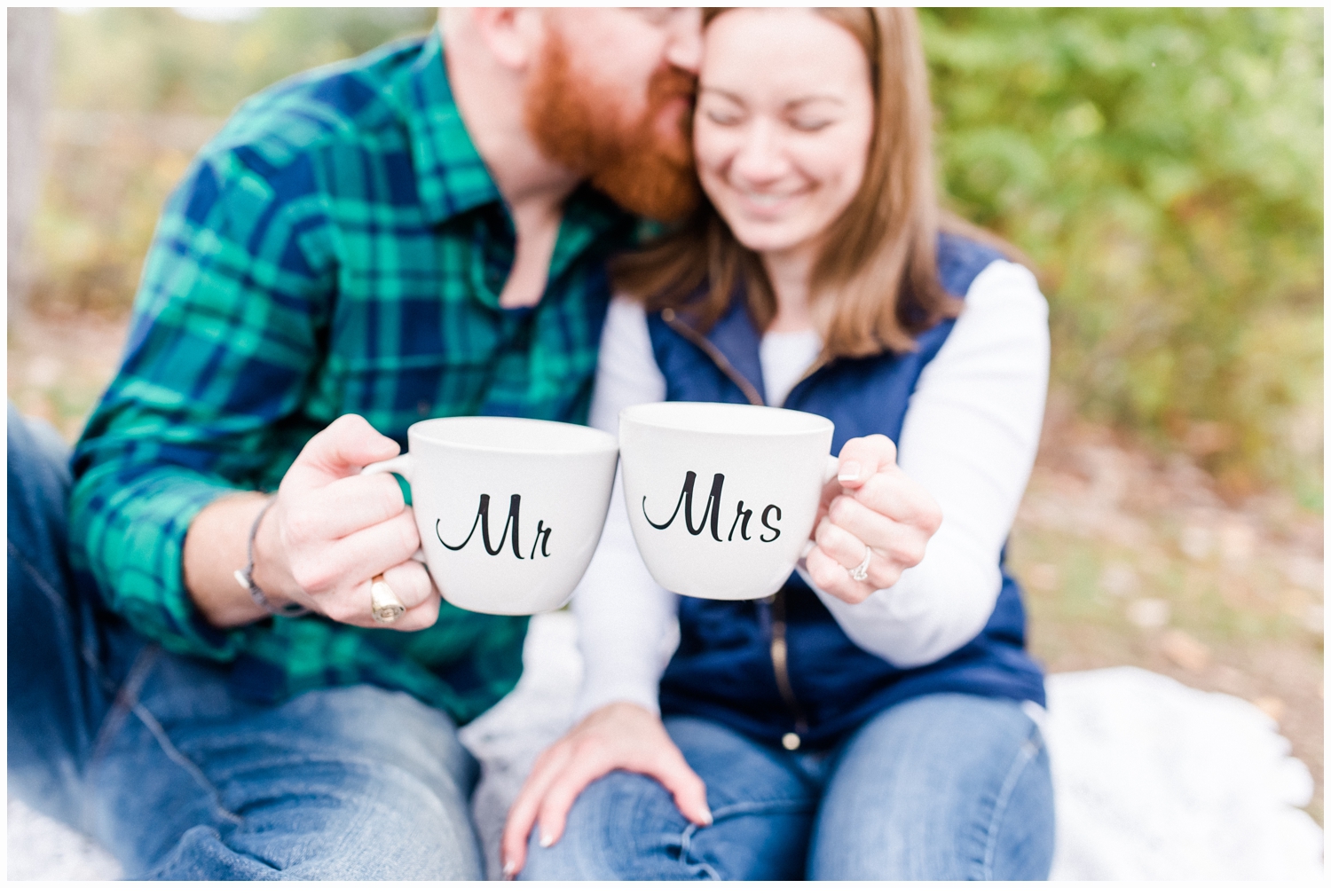 couple enjoying hot chocolate in mugs