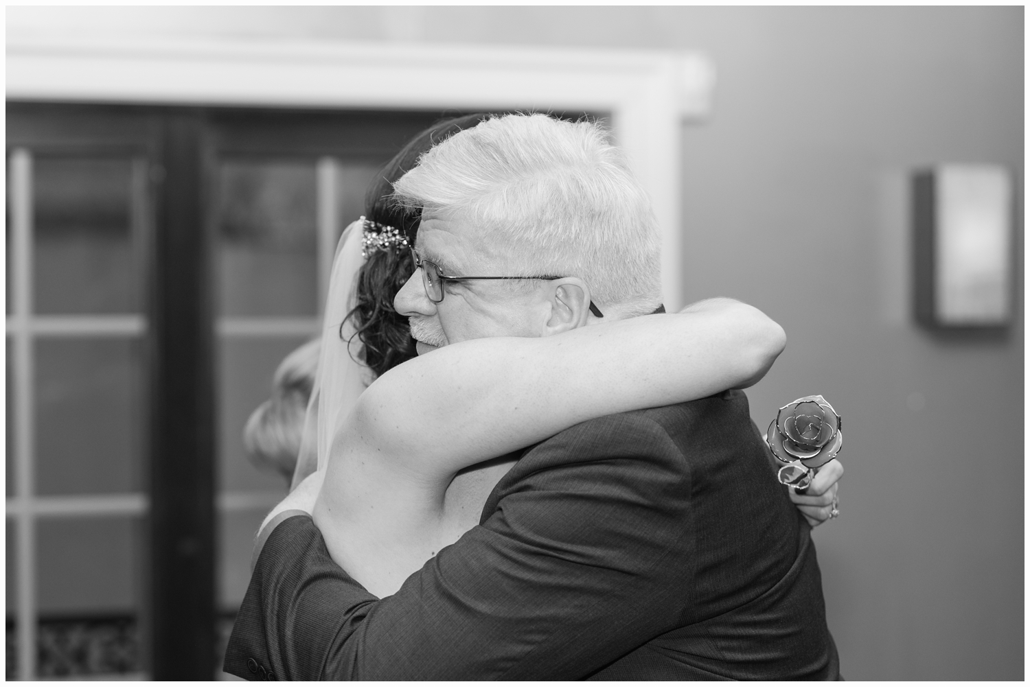 bride hugging her father in law