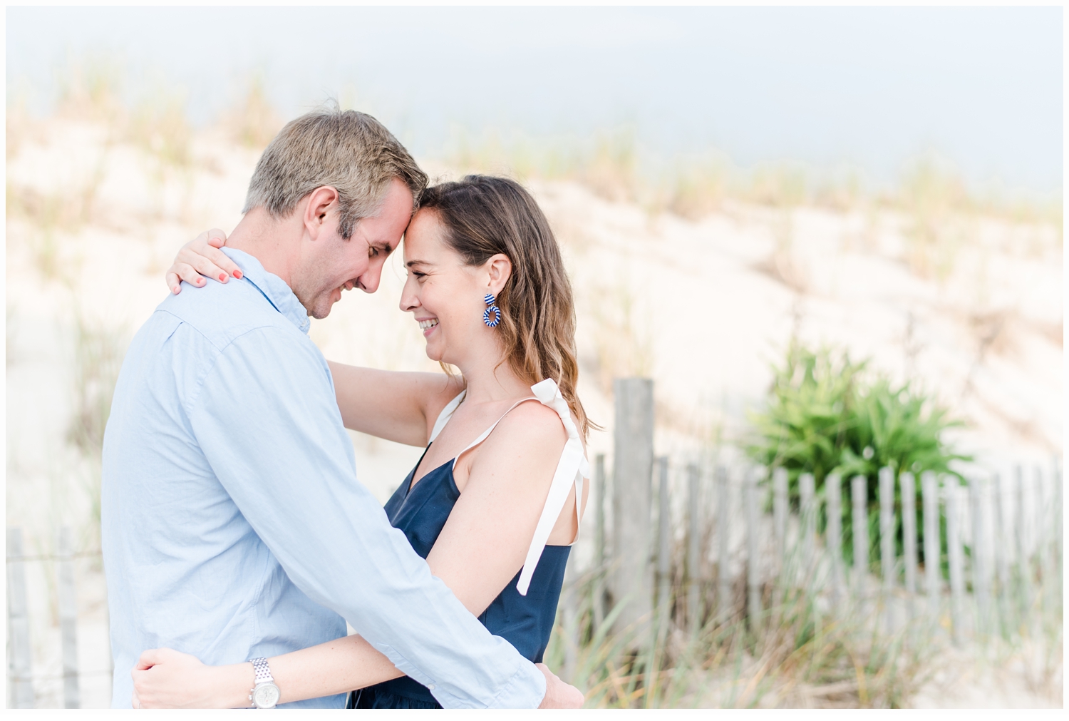 engagement session couple kissing
