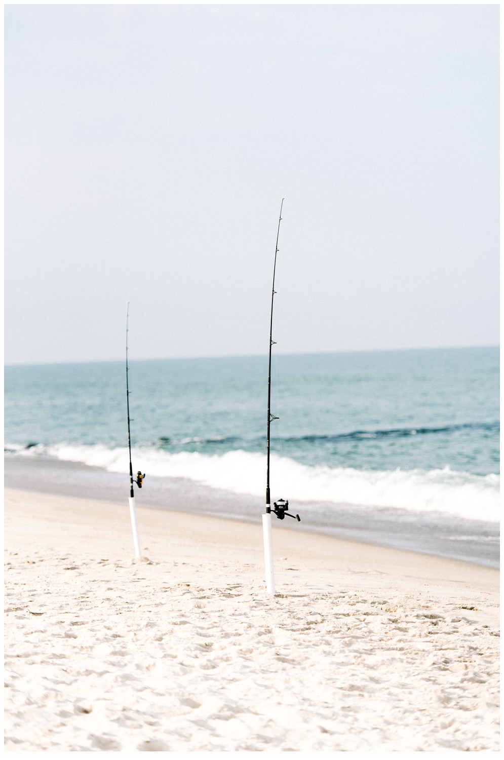 fishing poles on beach