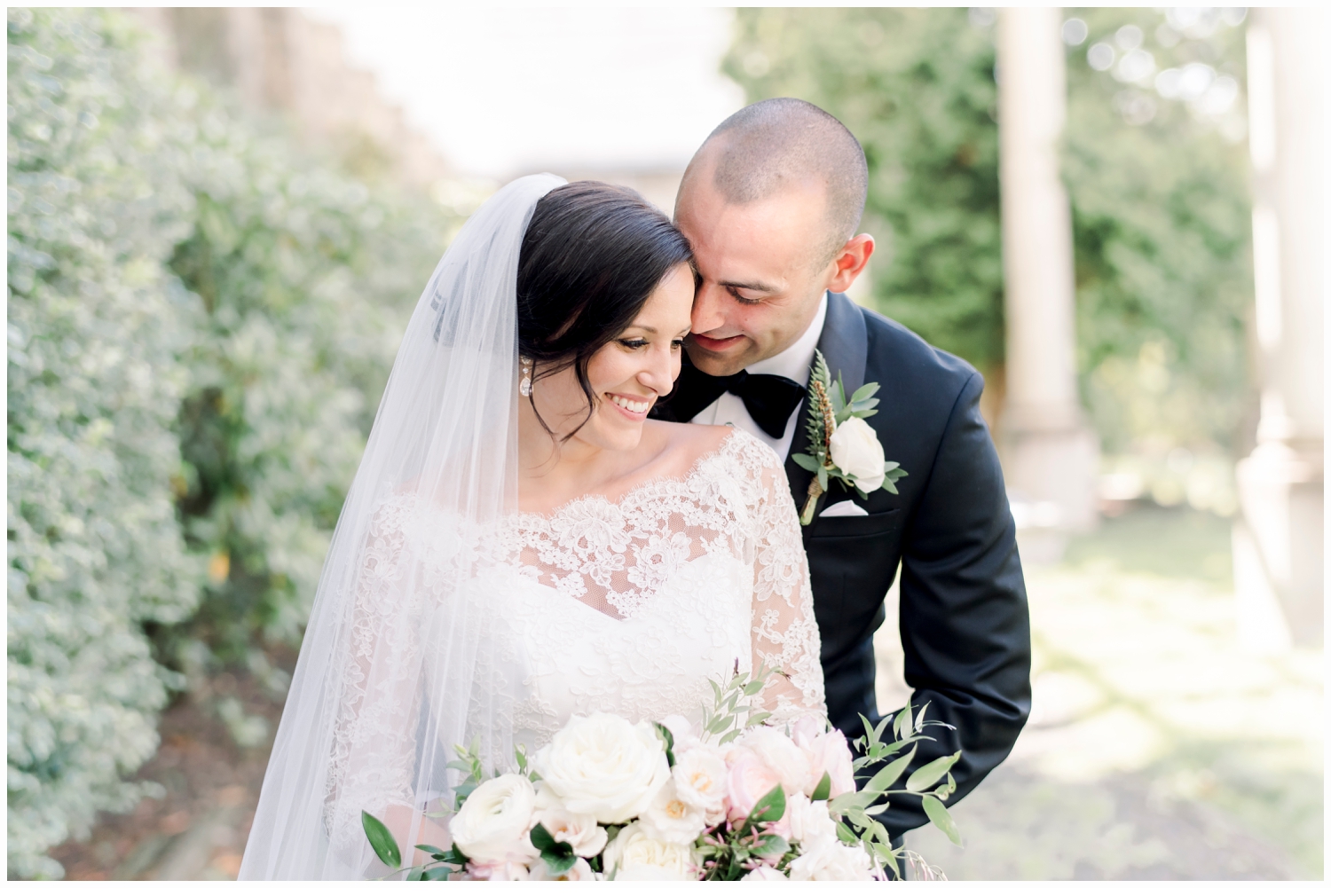 bride and groom on wedding day hugging