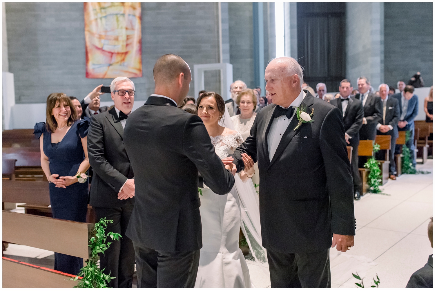 dad giving away bride to the groom