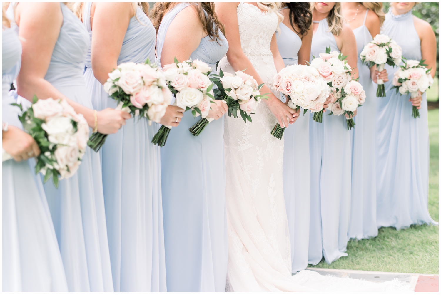 bridesmaids holding floral bouquets