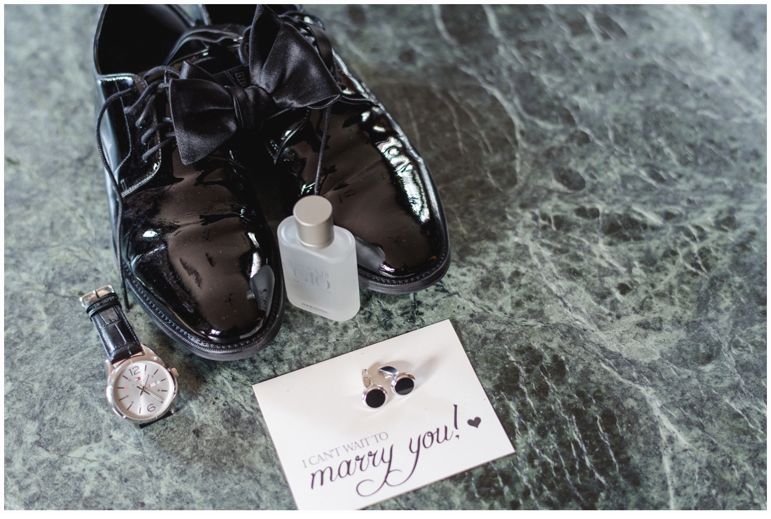 groom's wedding shoes and bow tie