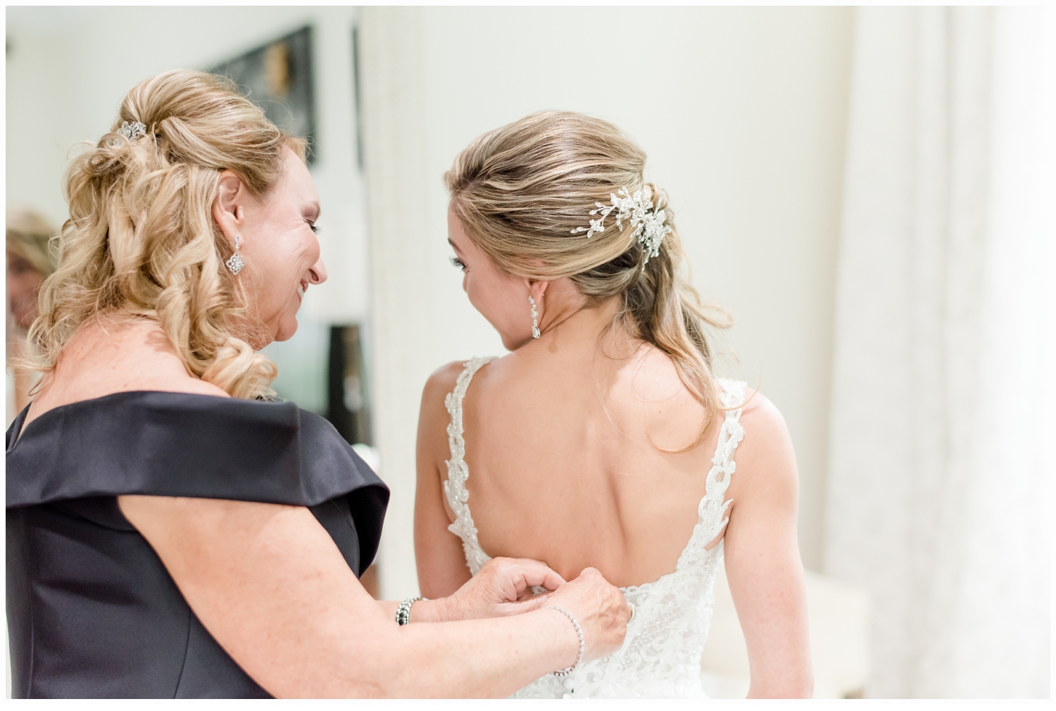 bride and mother getting ready