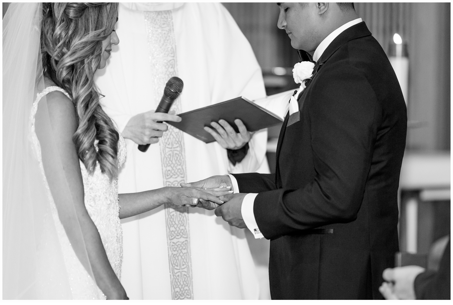 bride and groom exchanging rings