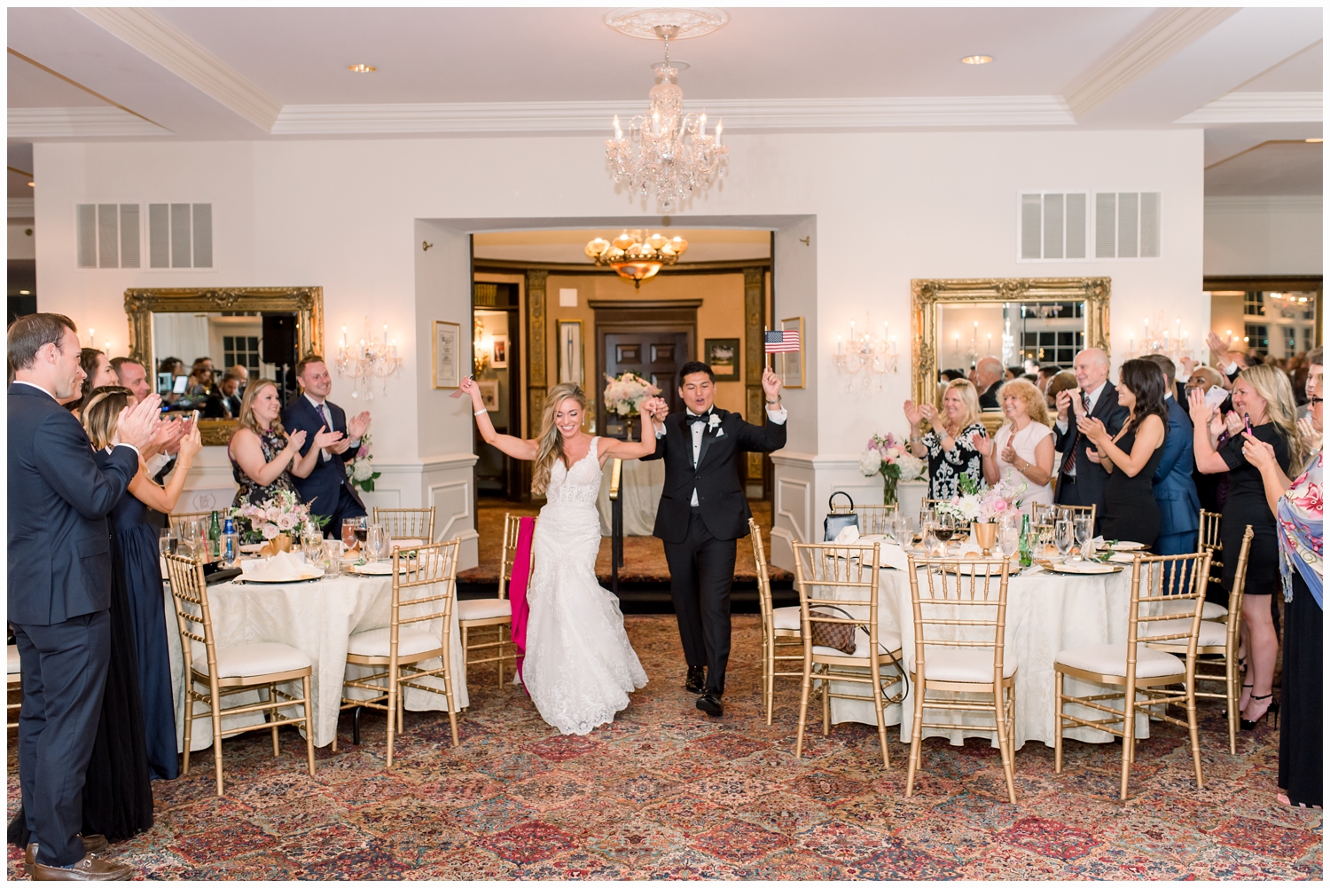 bride and groom entering wedding venue