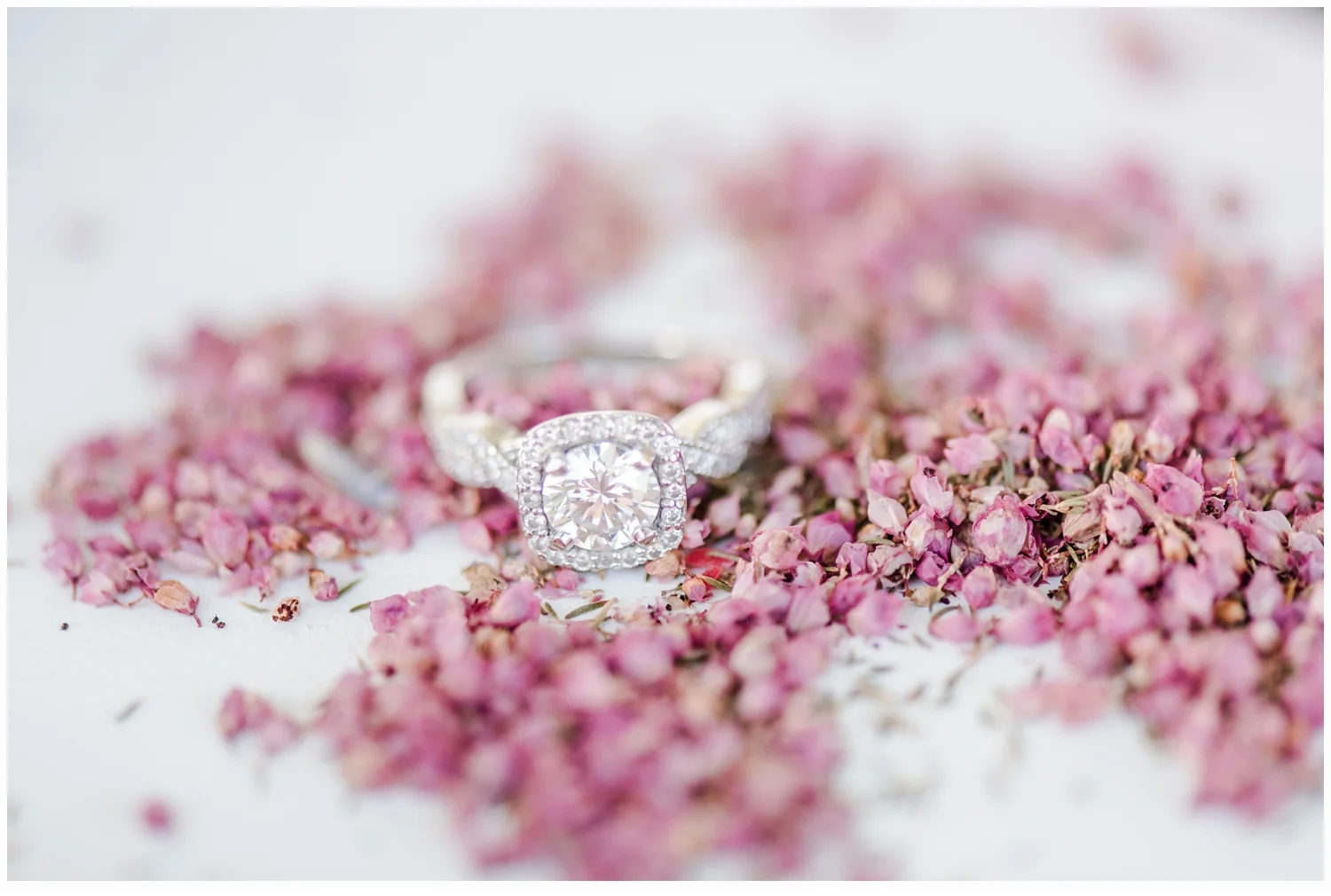 engagement ring on flowers