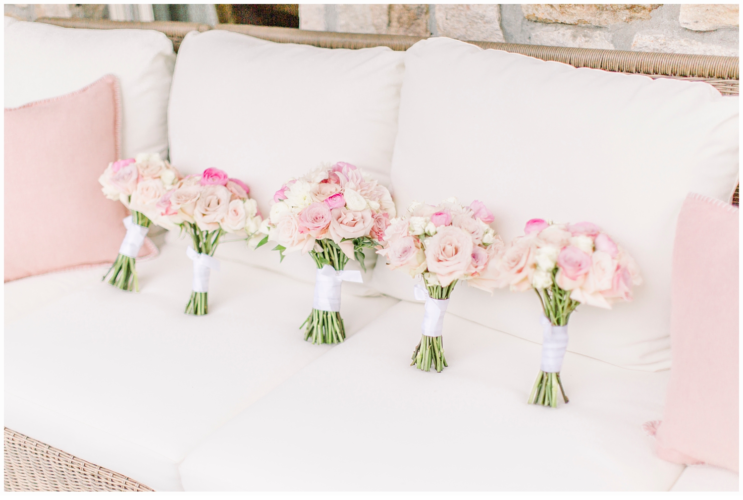 pink wedding bouquets on sofa