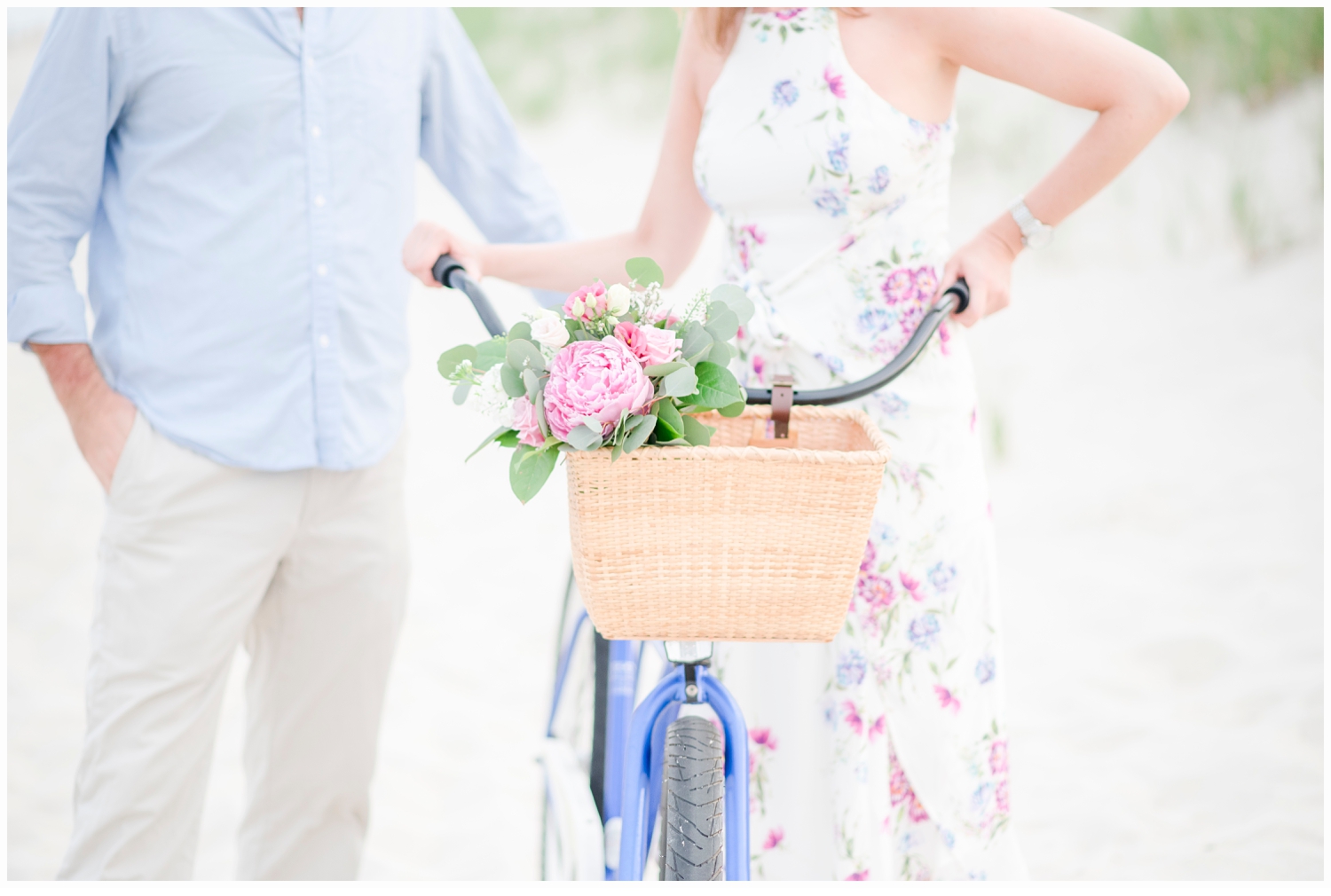 engaged couple riding a bicycle
