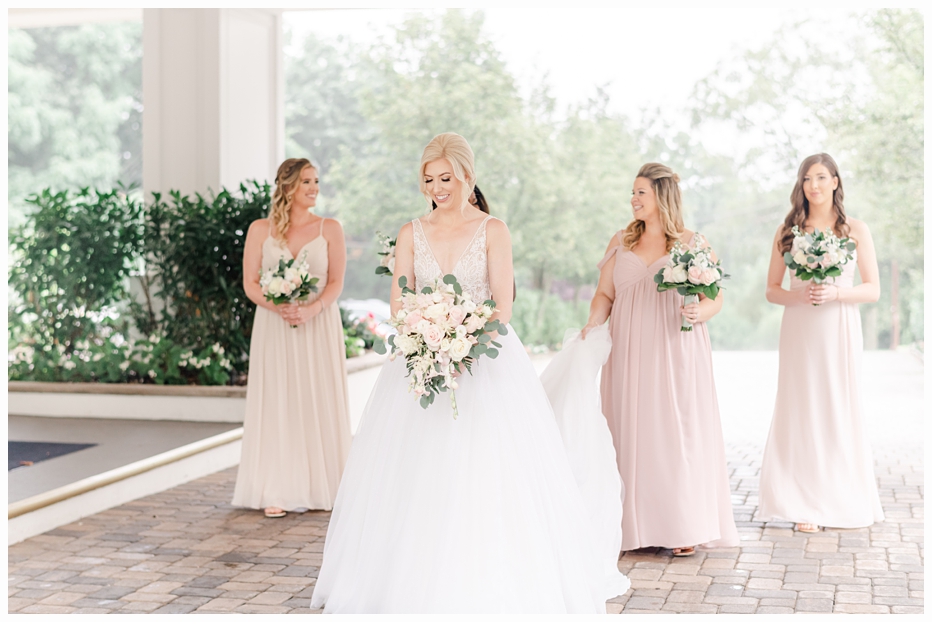 bride and bridesmaids walking together