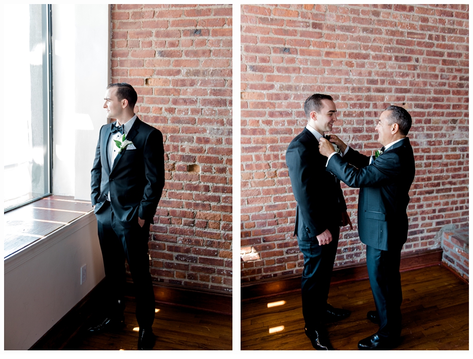 father putting on groom's bow tie