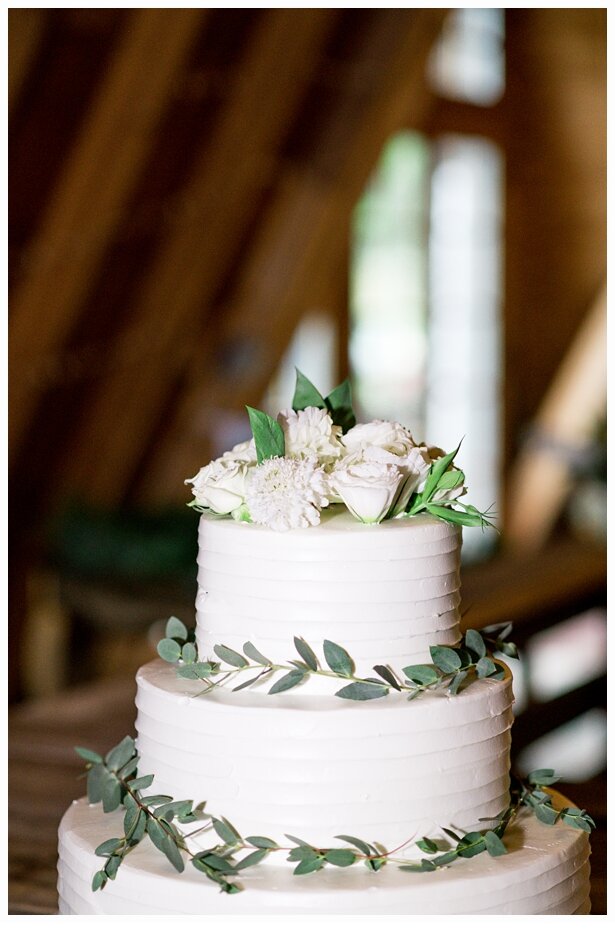 wedding cake in a barn