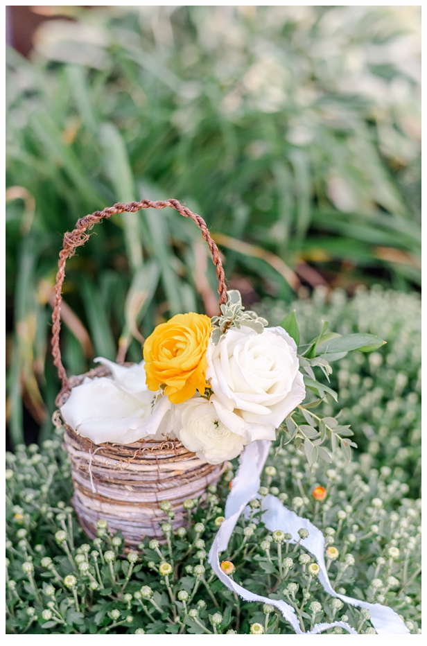 flower girl's basket of rose petals