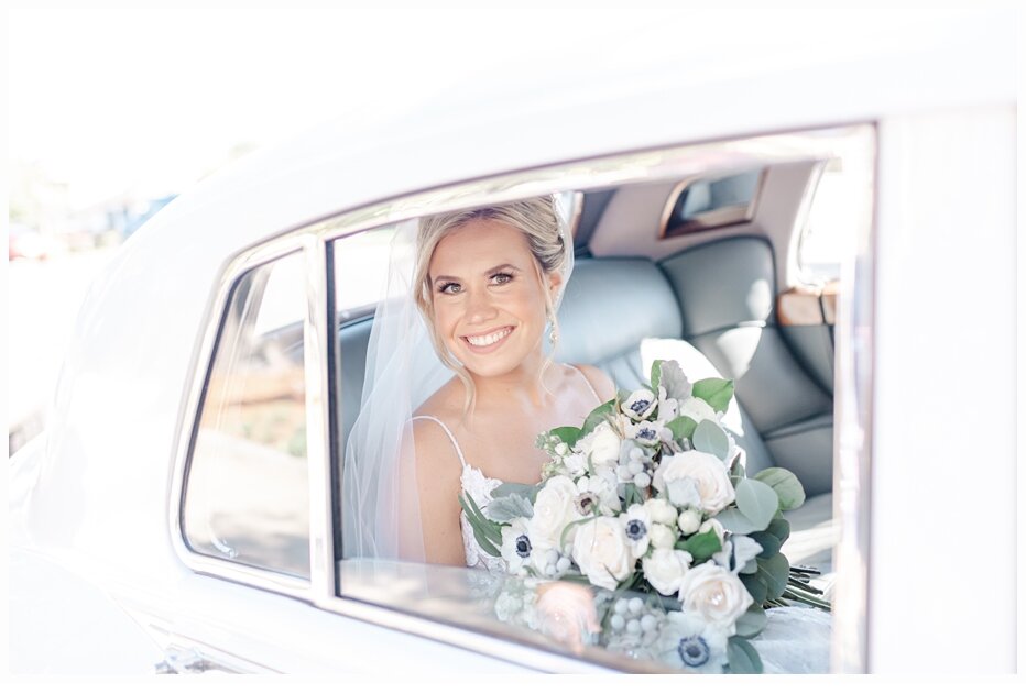 bride in limo going to the church