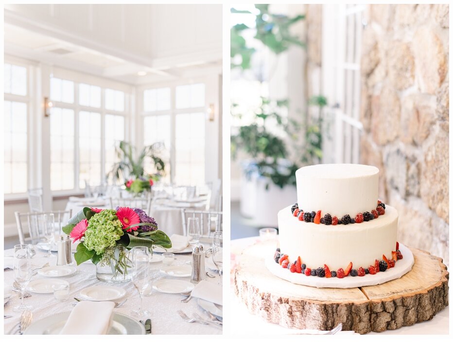 wedding cake and floral arrangement on table