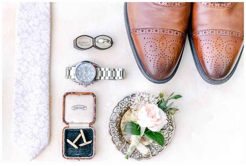 groom's ring and shoes and watch