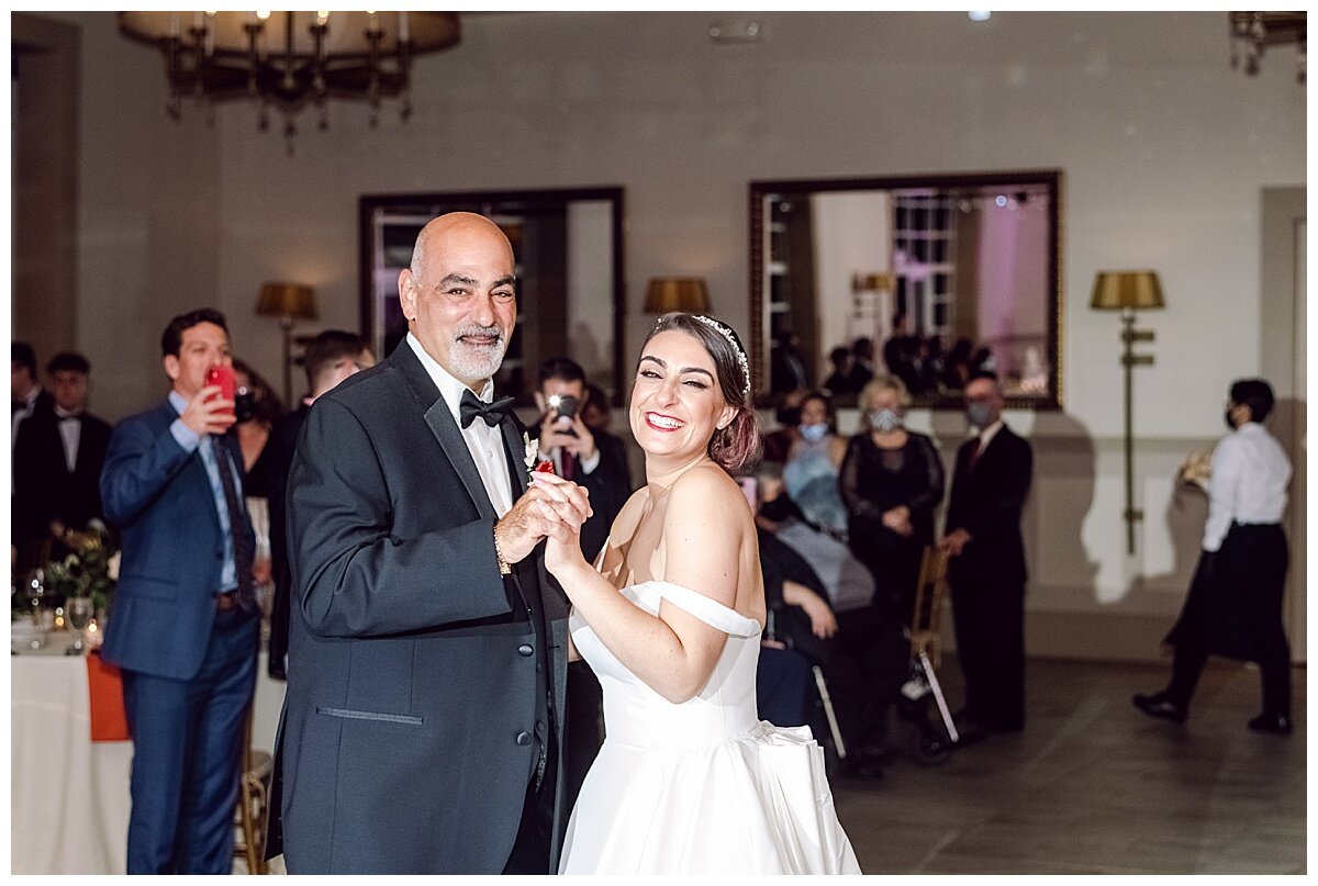father and daughter dancing at her wedding