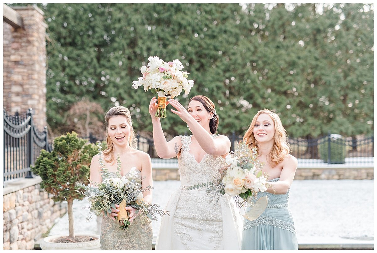 bride and bridesmaids tossing bouquets