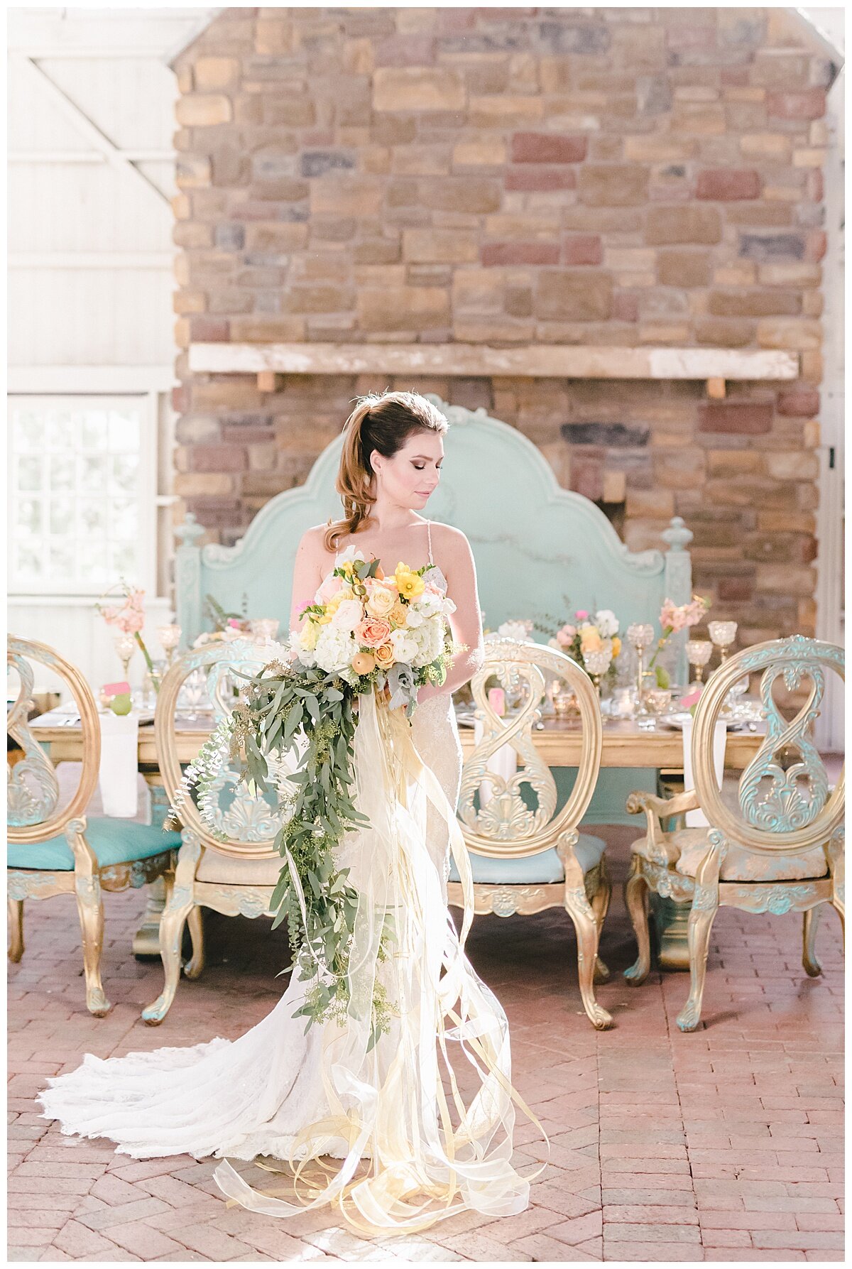 bride holding a wedding bouquet in a pretty room