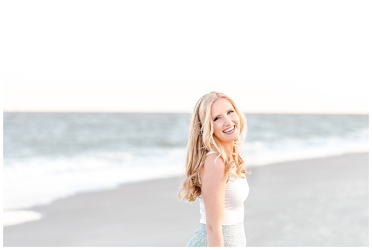 portrait of pretty bride to be on the beach