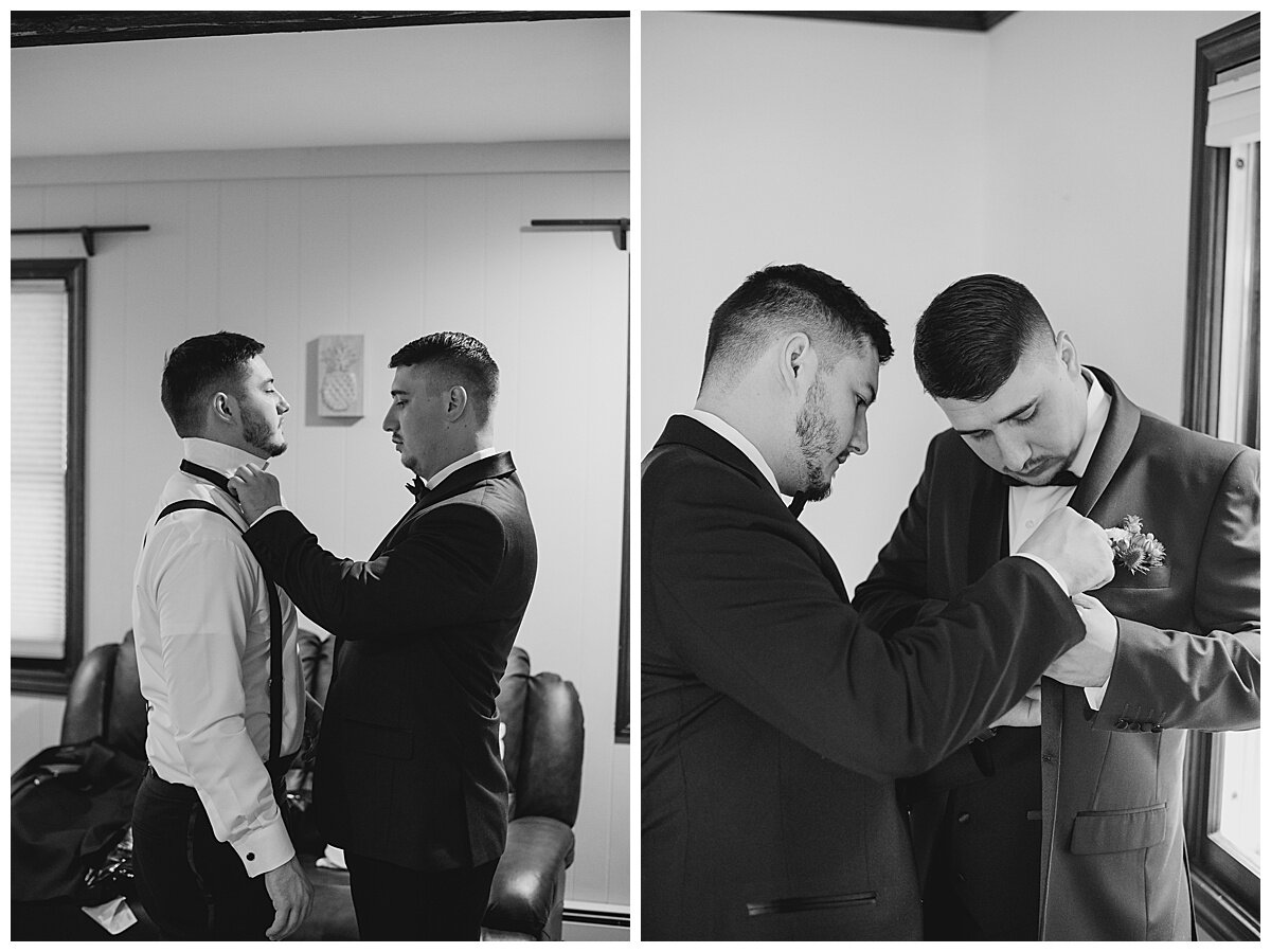 groom and best man putting on jacket