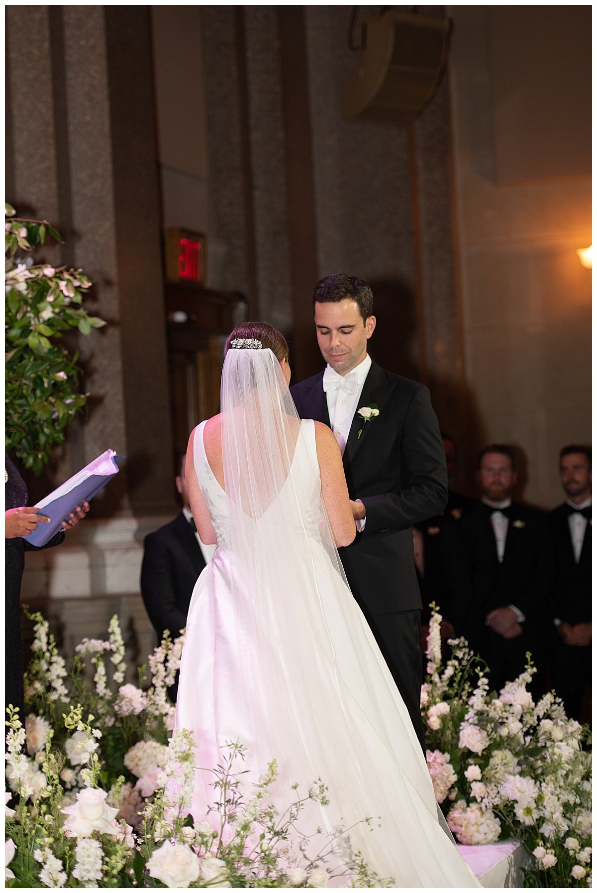 bride and groom saying their vows