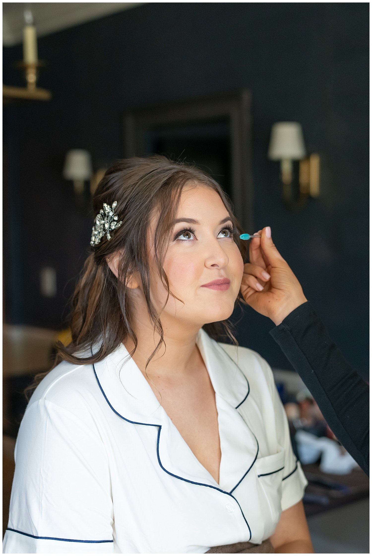 bride getting her makeup done