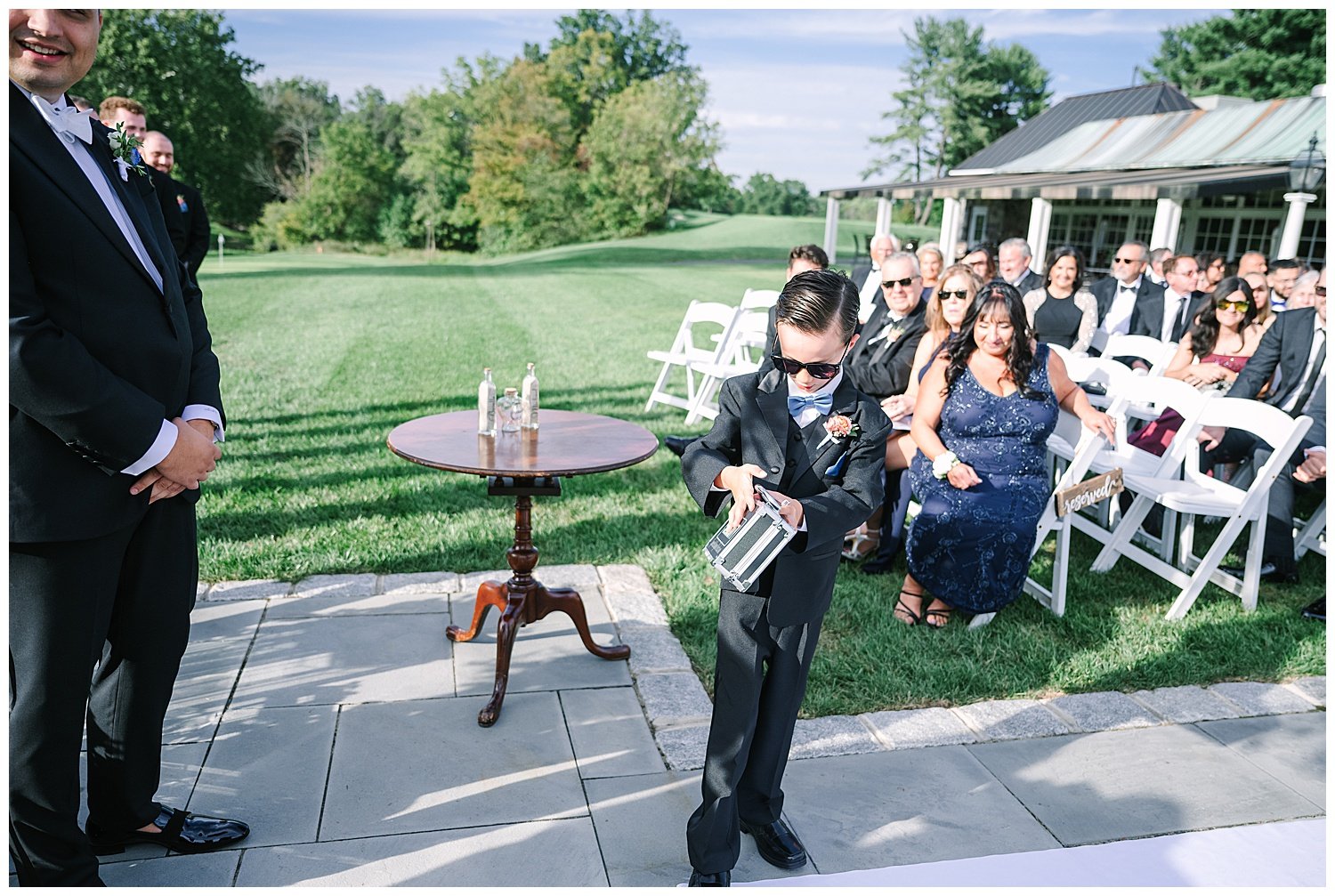 ring bearer carrying rings in a case