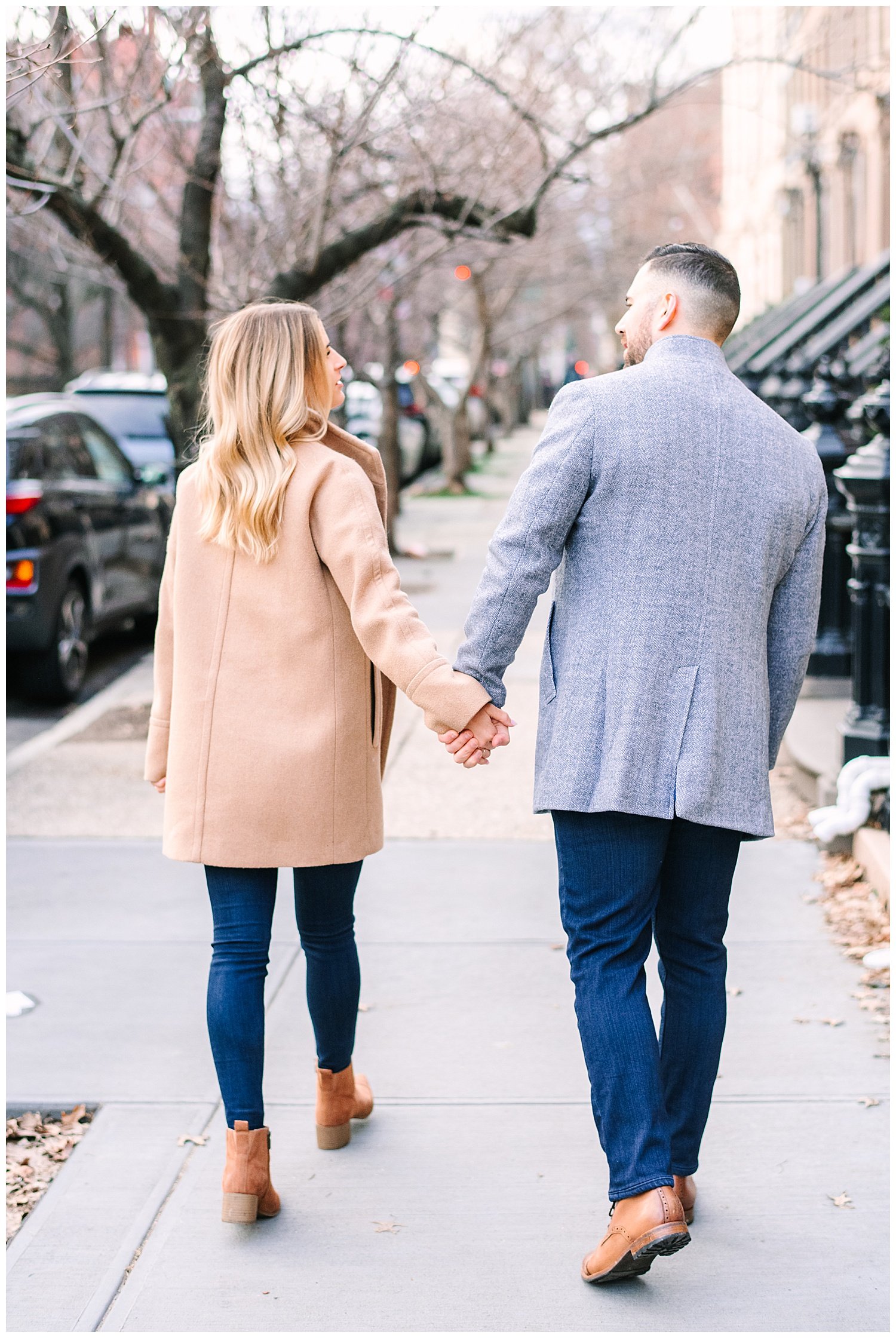 engaged couple walking in jersey city
