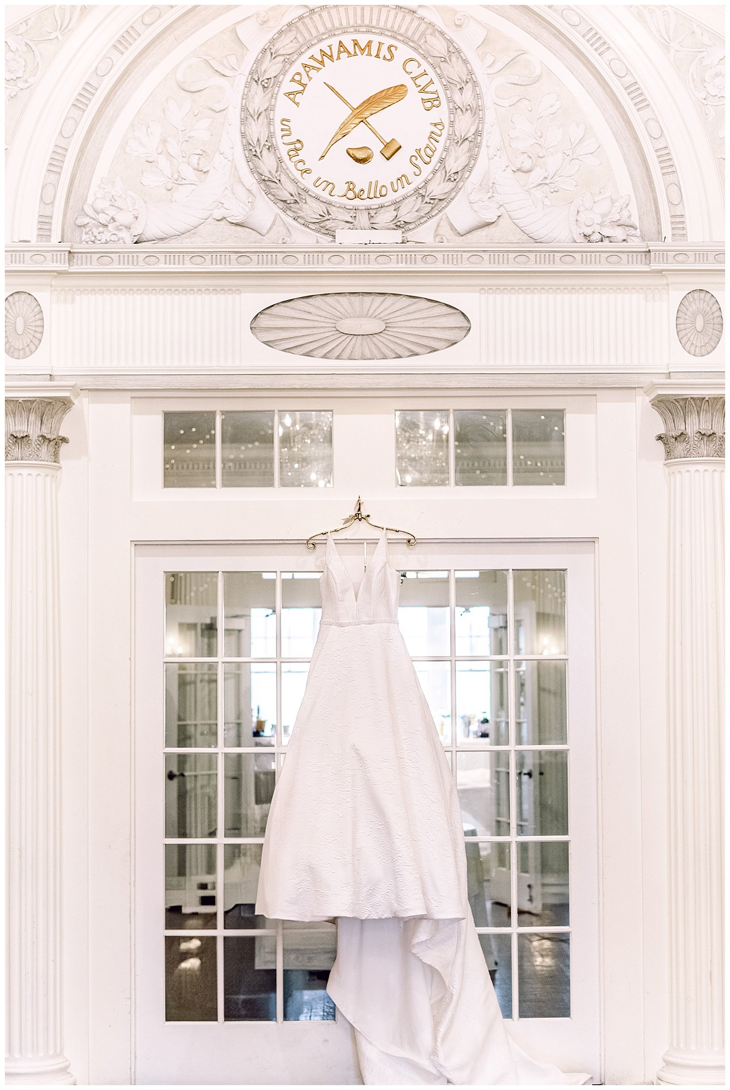 bridal gown hanging on a pretty door