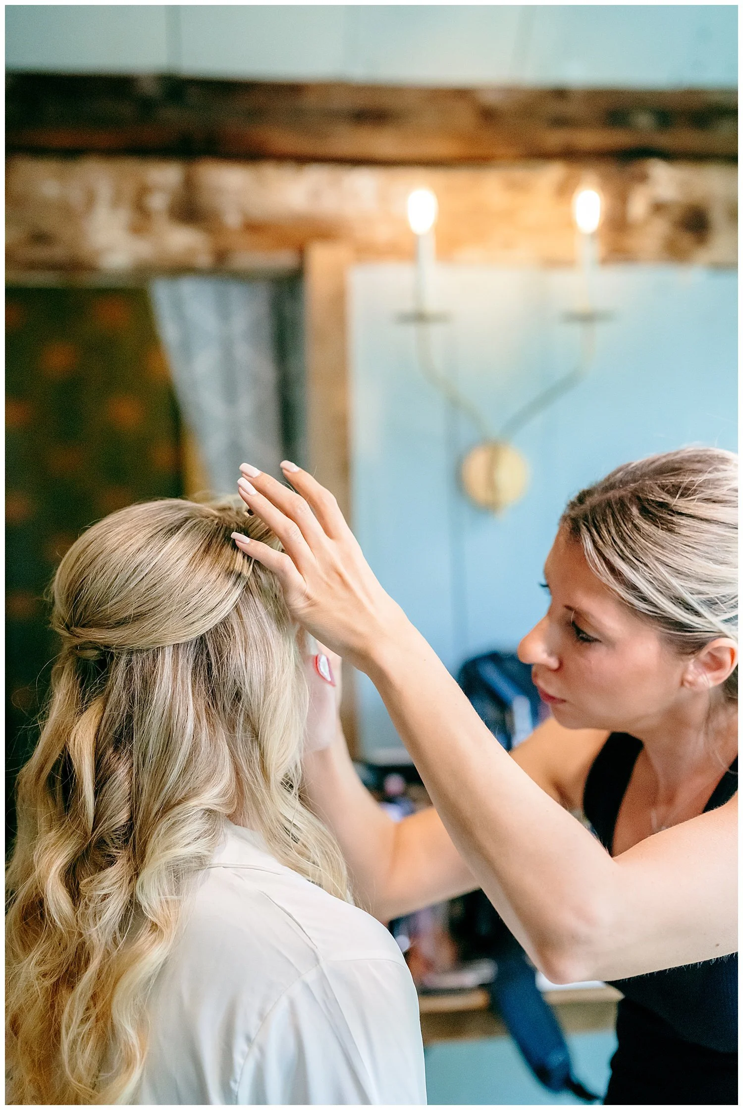 bride having makeup applied