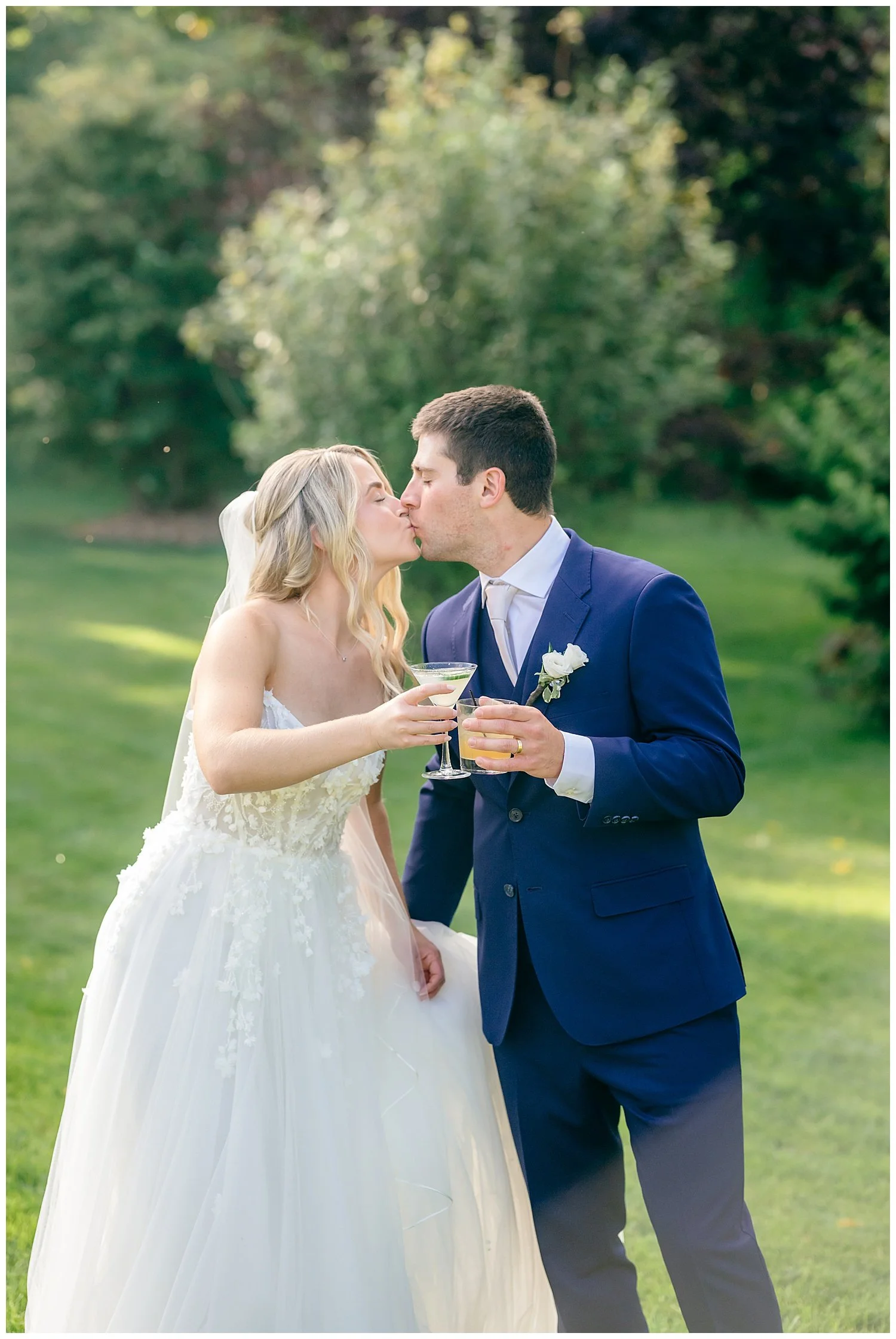 bride and groom having a champagne toast