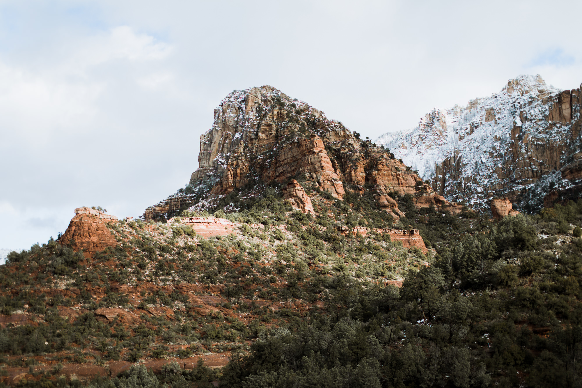 snowy desert engagement photos in sedona, arizona // adventure wedding photographer // www.abbihearne.com