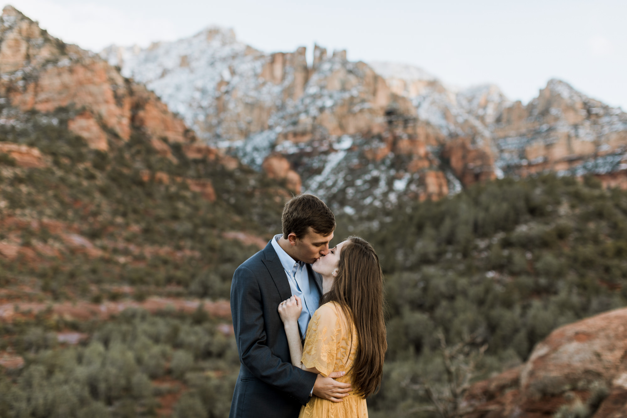 snowy desert engagement photos in sedona, arizona // adventure wedding photographer // www.abbihearne.com