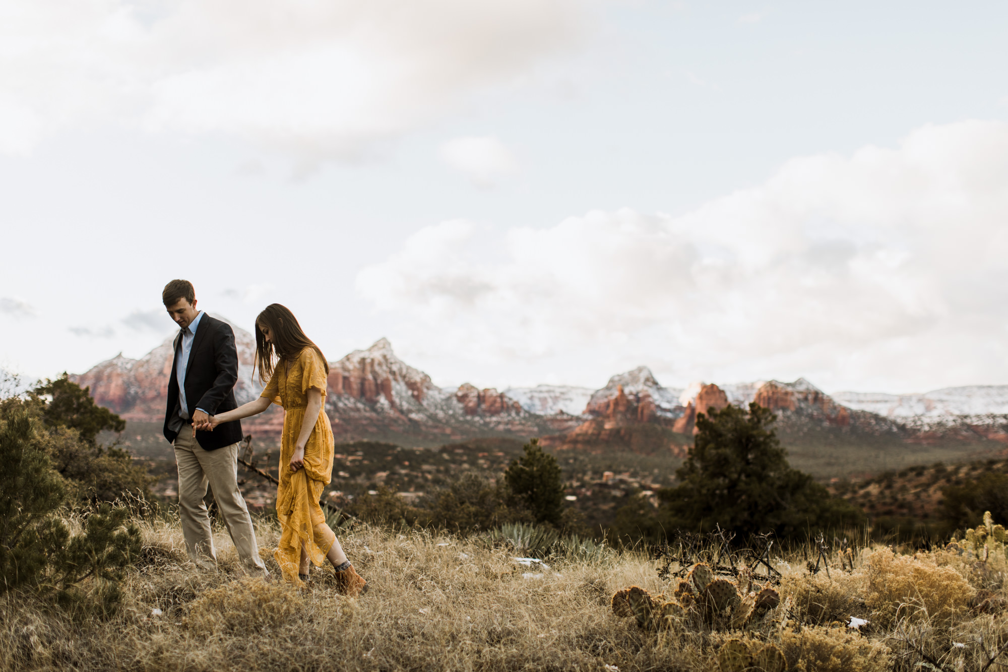 snowy desert engagement photos in sedona, arizona // adventure wedding photographer // www.abbihearne.com