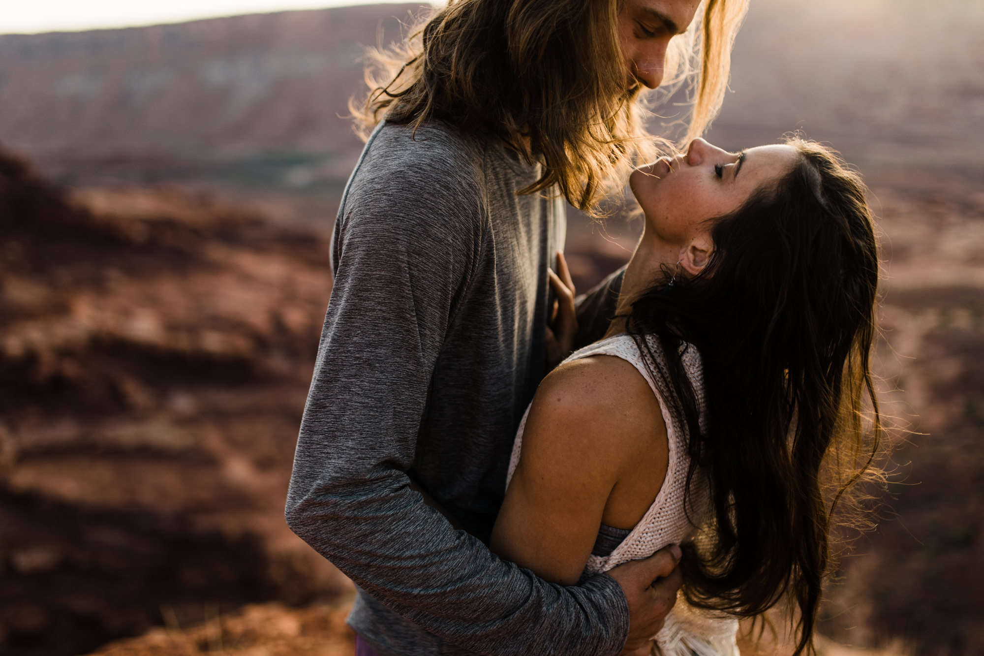 extreme acro-yoga engagement session in moab, utah // desert elopement inspiration // adventure wedding photographers // the hearnes adventure wedding photography // www.thehearnes.com