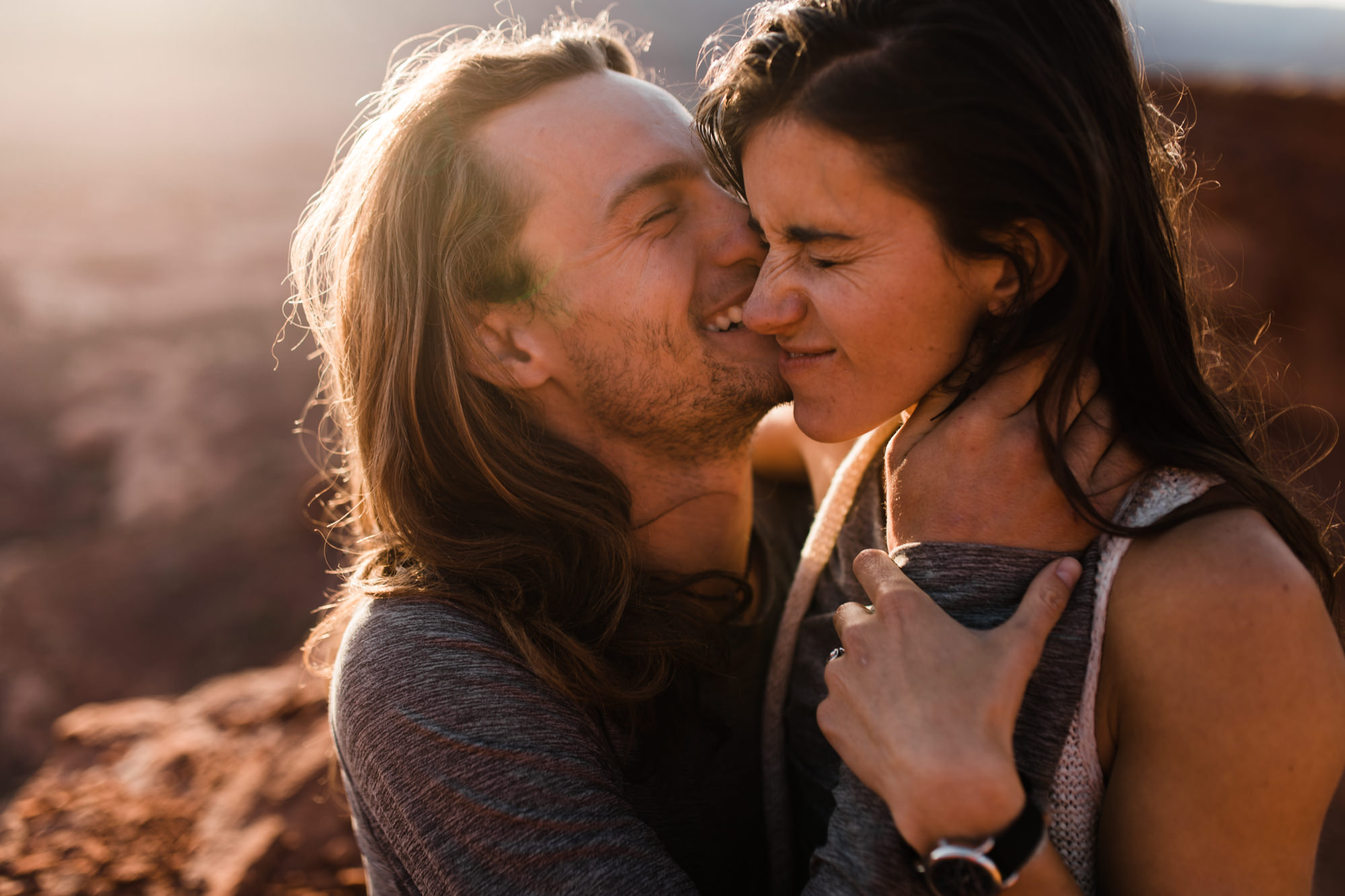 extreme acro-yoga engagement session in moab, utah // desert elopement inspiration // adventure wedding photographers // the hearnes adventure wedding photography // www.thehearnes.com