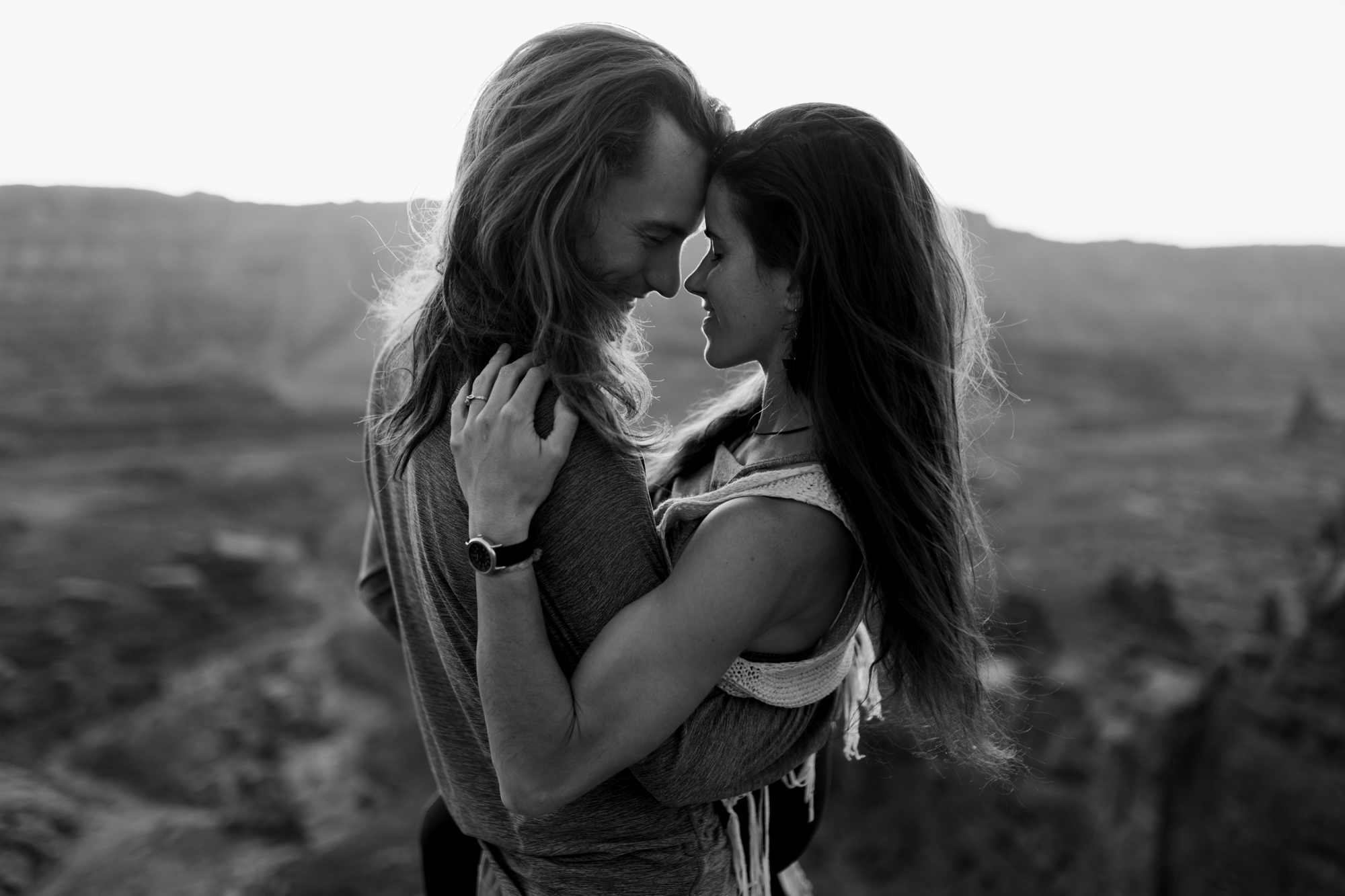 extreme acro-yoga engagement session in moab, utah // desert elopement inspiration // adventure wedding photographers // the hearnes adventure wedding photography // www.thehearnes.com